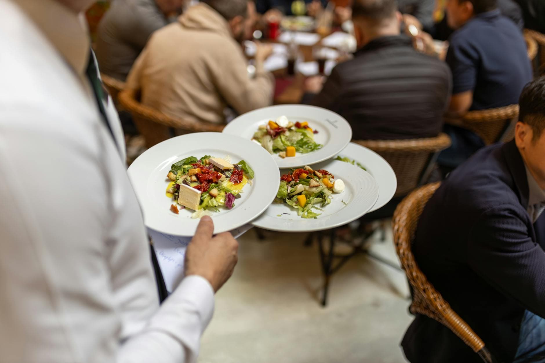 Restaurant team preparing food during service